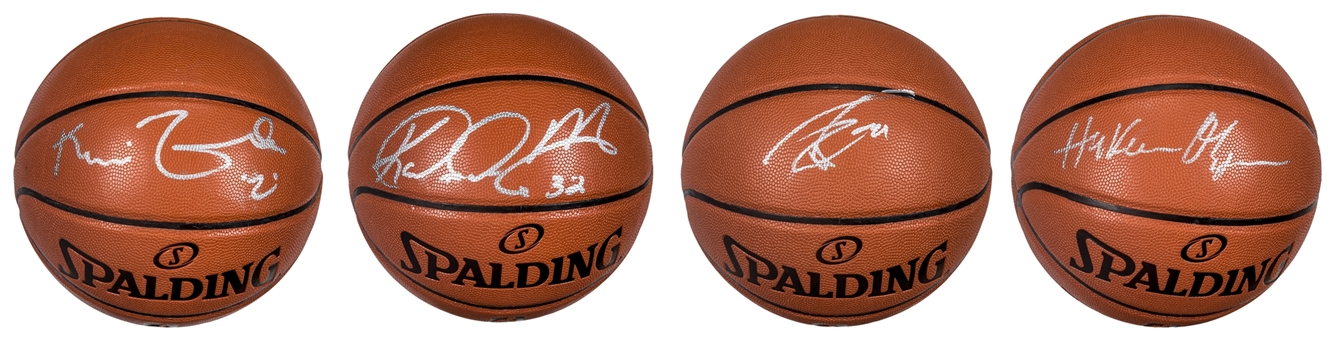 Lot of (4) Hall Of Famers & Legends Signed Basketballs: Garnett, Malone, Duncan & Olajuwon (PSA/DNA, JSA & Beckett)